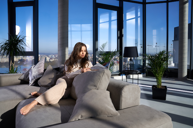 divorced woman reclining in penthouse