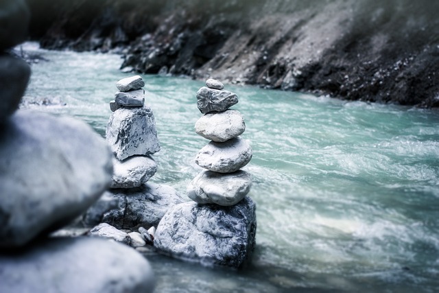 2 piles of stones in a river representing joint divorce application