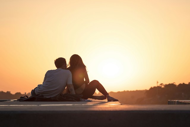 couple watching sunrise together