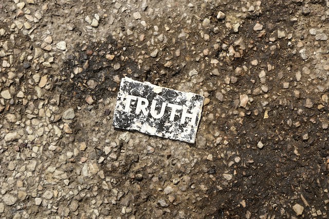 the word truth in white on faded black paper representing myths about non matrimonial assets in divorce
