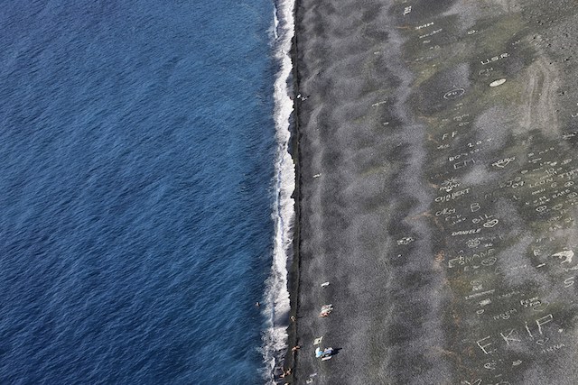 overhead shot of the tide meeting the coastline, representing two people separating