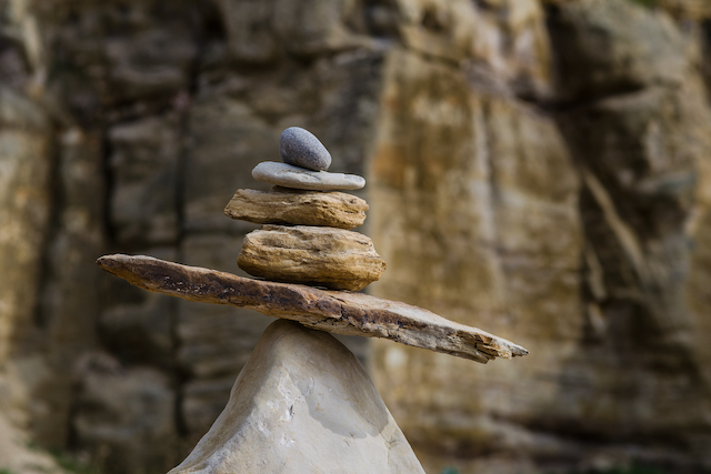 balancing-stones-2025-10-06-16-58-54-utc Stones stacked on top of each other to represent the delicate balance required for Business Valuation for Divorce
